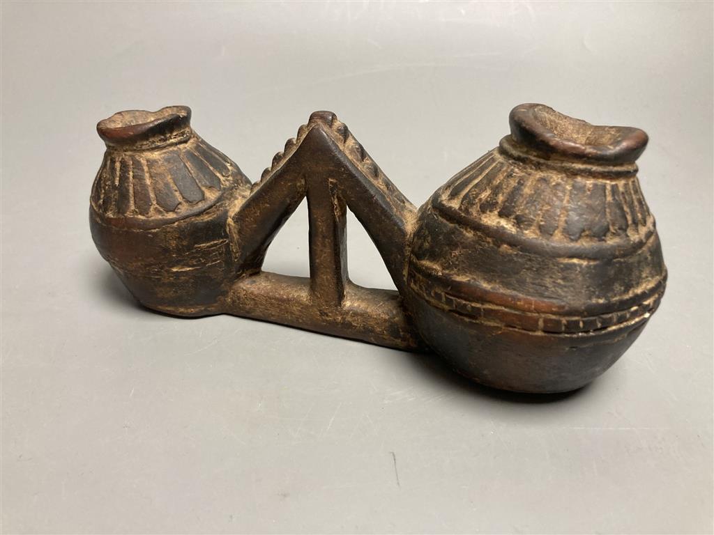 A Tribal wood double vessel, 21cm wide